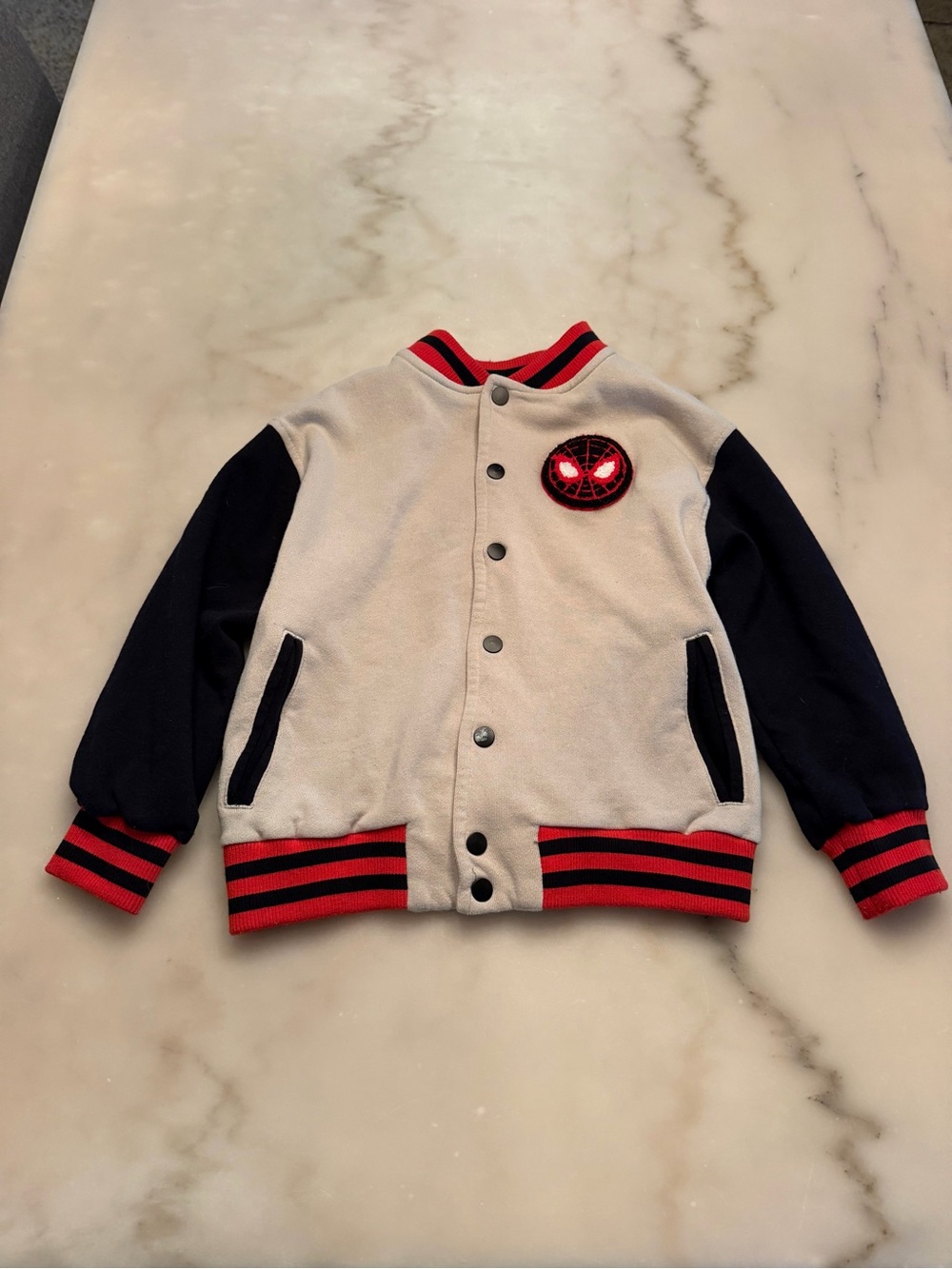 Marvel Cream and Black Spider-Emblem Kids Varsity Jacket with Red Trim